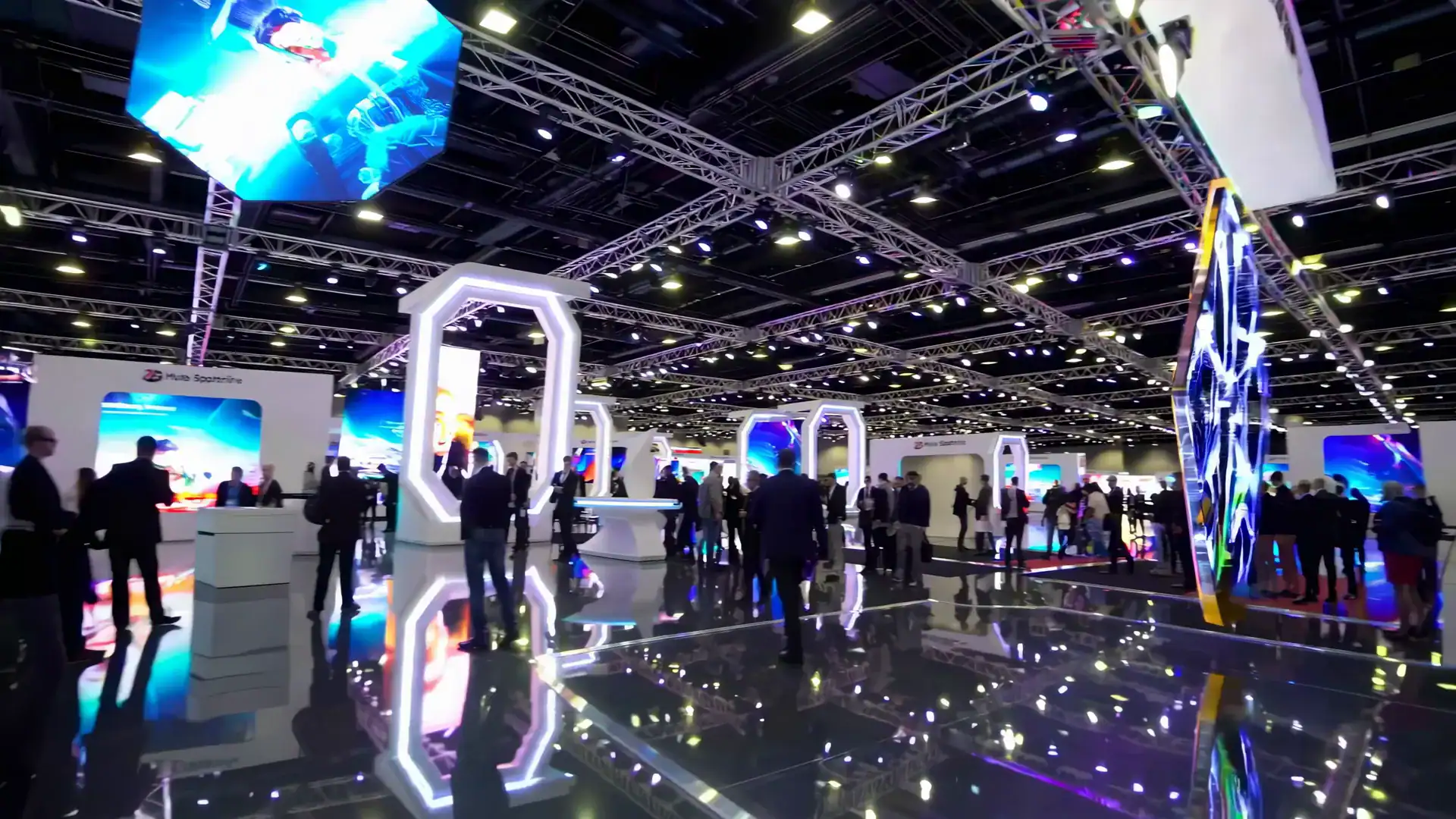 Corporate event in Dubai showcasing modern stage technology and lighting